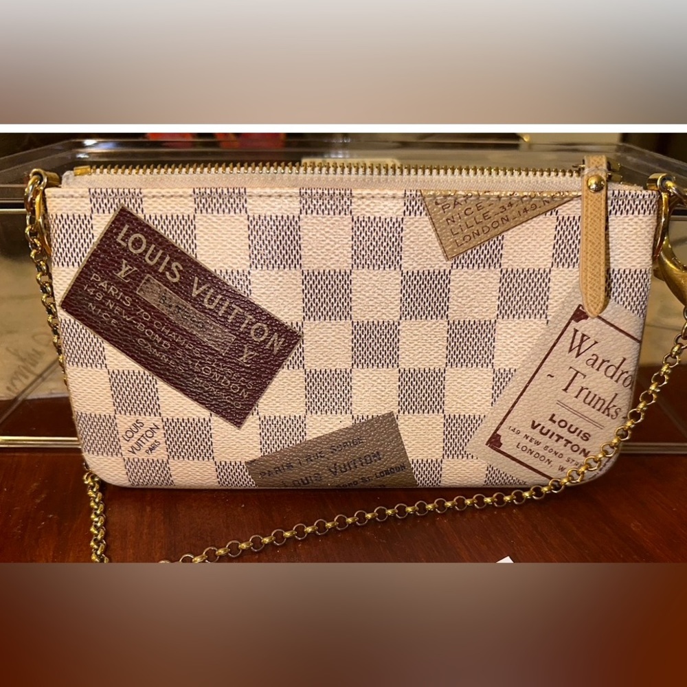 Authentic rare Louis Vuitton Milla Trunks Labels pochette